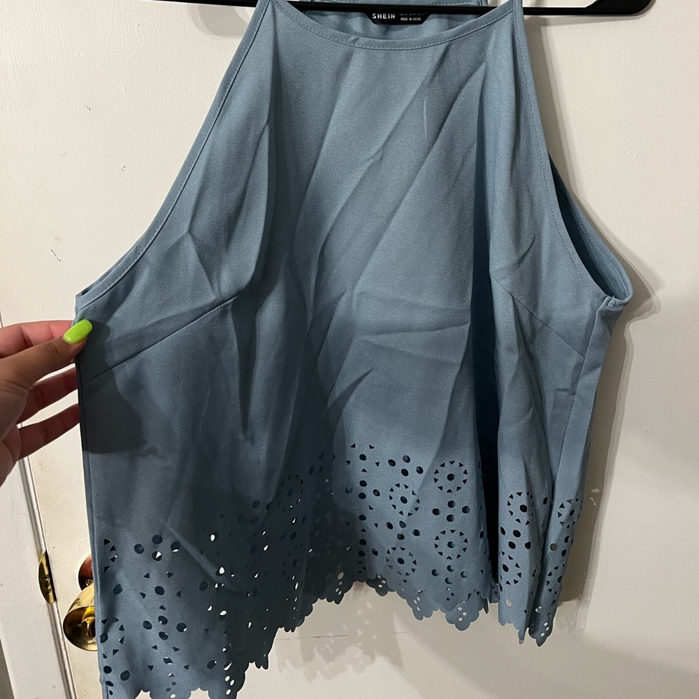 light blue tank top :)